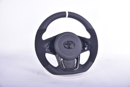 In Stock Toyota Supra Perforated Top and Bottom / Alcantara Sides / Carbon